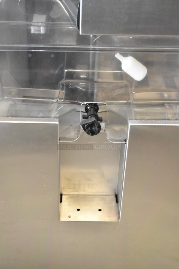 JBT 2ND-GEN-MFJ-HE commercial citrus juicer, stainless steel, floor style, on casters, 120V, 1 phase, excellent condition.