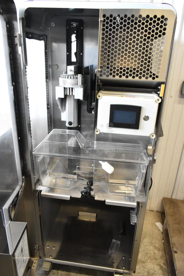 LATE MODEL JBT 2ND-GEN-MFJ-HE stainless steel commercial citrus juicer with casters, touchscreen, 120V, 1 Phase.