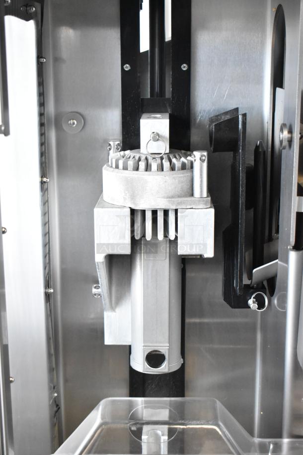 JBT 2ND-GEN-MFJ-HE stainless steel citrus juicer, floor style, commercial casters, 120V, excellent condition.