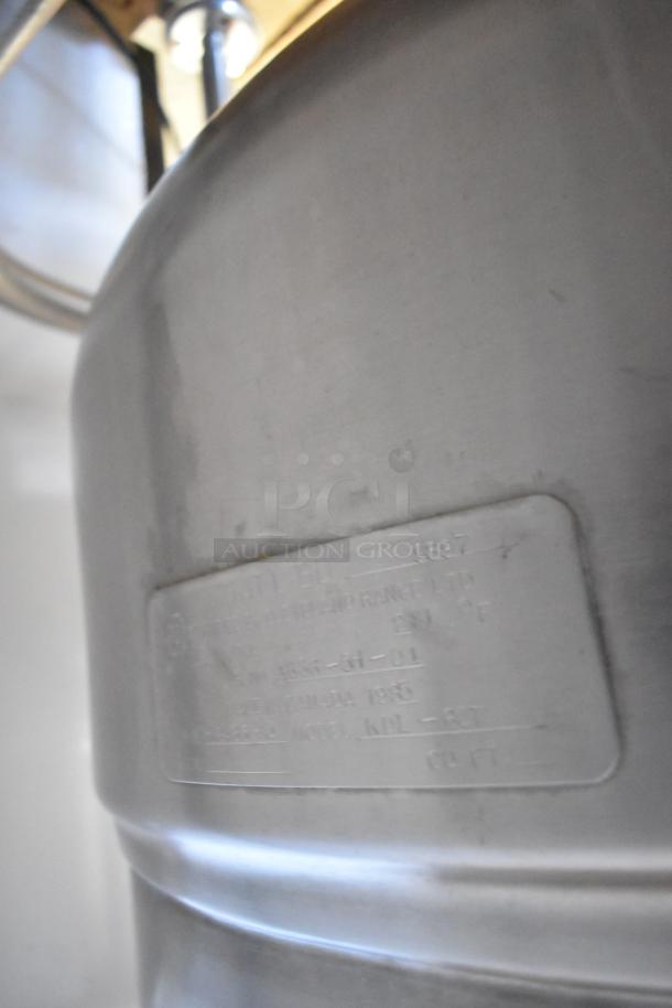 Cleveland KDL-60T stainless steel 60-gallon steam kettle, commercial floor style. Features manufacturer label detailing model.