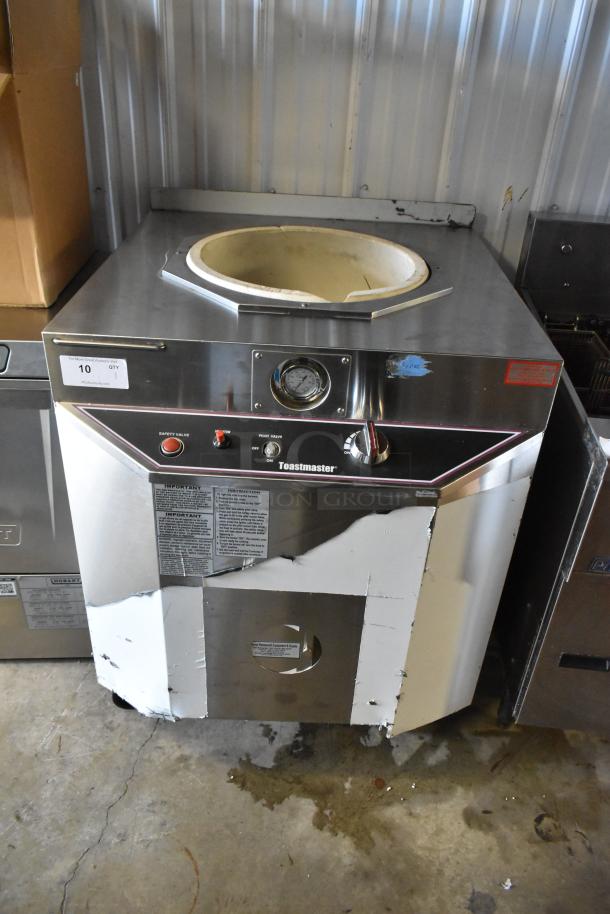 Toastmaster TCT-1627 R stainless steel tandoor oven, natural gas, 85,500 BTU, on casters, with control panel and safety valves.