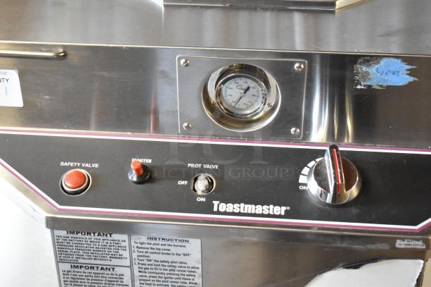 Toastmaster TCT-1627 R stainless steel commercial tandoor oven with safety valve, igniter, and controls. 85,500 BTU, on casters.