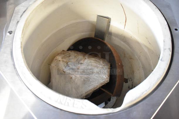 Toastmaster TCT-1627 R stainless steel tandoor oven, natural gas, 85,500 BTU, on casters. Interior view, commercial use.