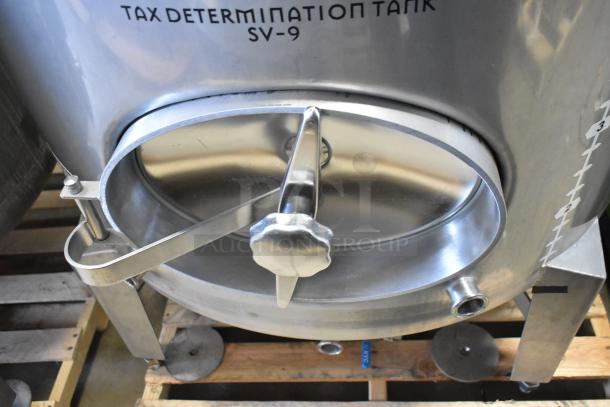 Stainless steel 10 BBL/420 gallon tax determination tank, labeled "SV-9", in excellent condition with side valve and measurement markings.