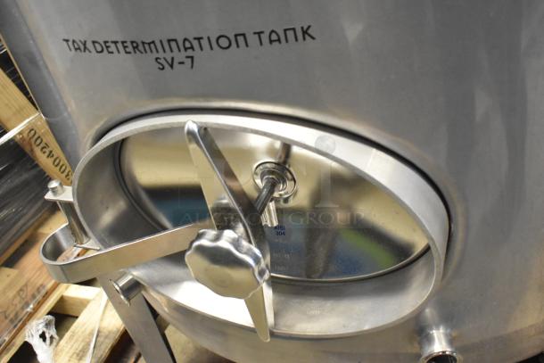 Stainless Steel 10 BBL/420 Gallon Beer Tax Determination Tank with "SV-7" label, used for commercial brewing operations.