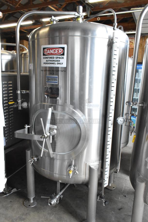 JV Northwest stainless steel 10 BBL/420 gallon beer brewing tank in excellent condition. Features gauge, labels, and secure fittings.