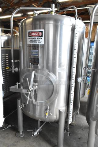JV Northwest stainless steel 10 BBL/420 gallon beer brewing tank in excellent condition. Features gauge, labels, and secure fittings.