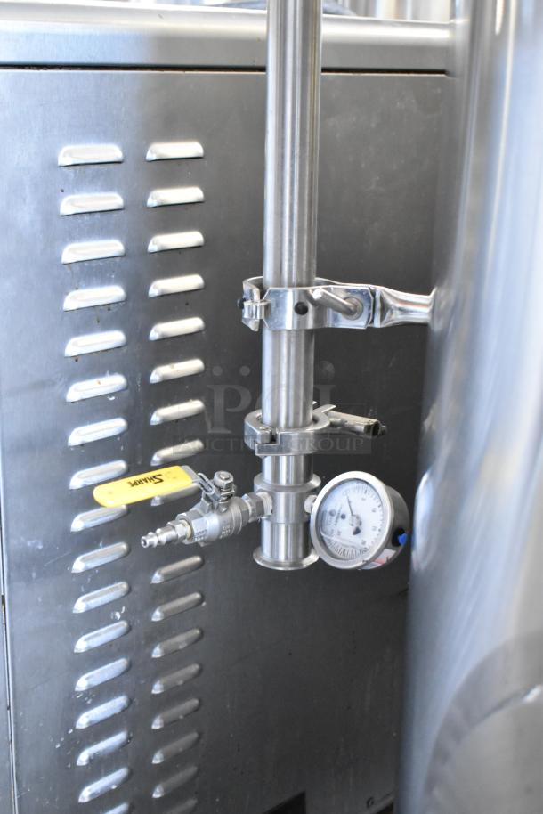 JV Northwest 10 BBL stainless steel brewing tank, 420-gallon capacity, features pressure gauge and valve, in good condition.