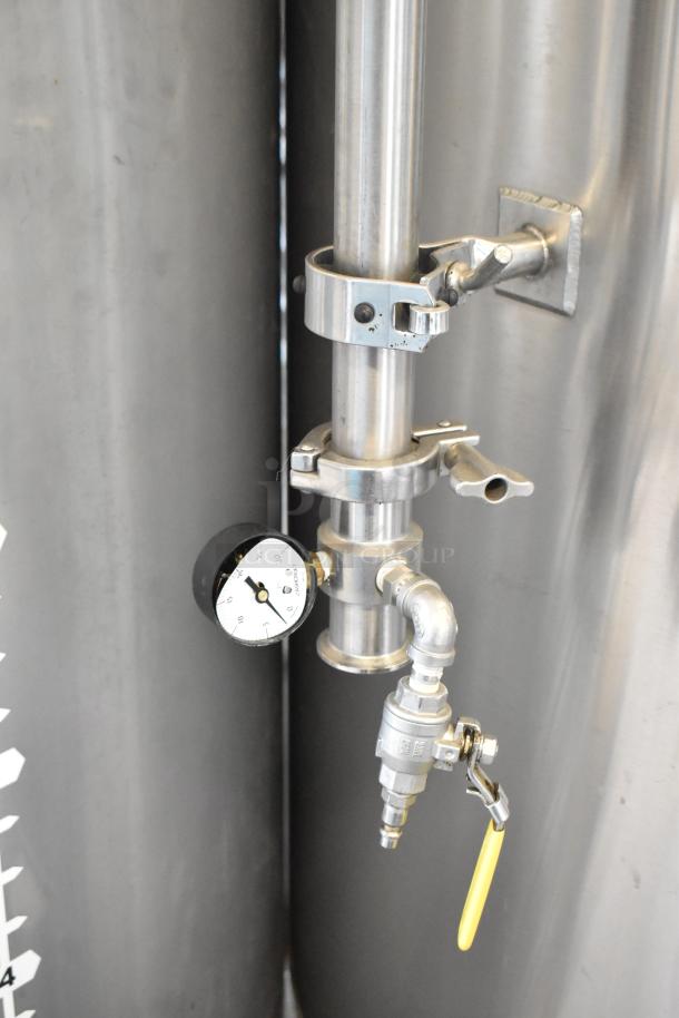JV Northwest 10 BBL stainless steel brewing tank. Features a pressure gauge and valve. Ideal for commercial beer fermentation.