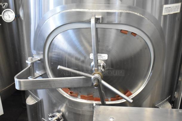 JV Northwest 10 BBL stainless steel beer brewing tank, 420-gallon capacity. Features front access hatch and gauges. Excellent condition.