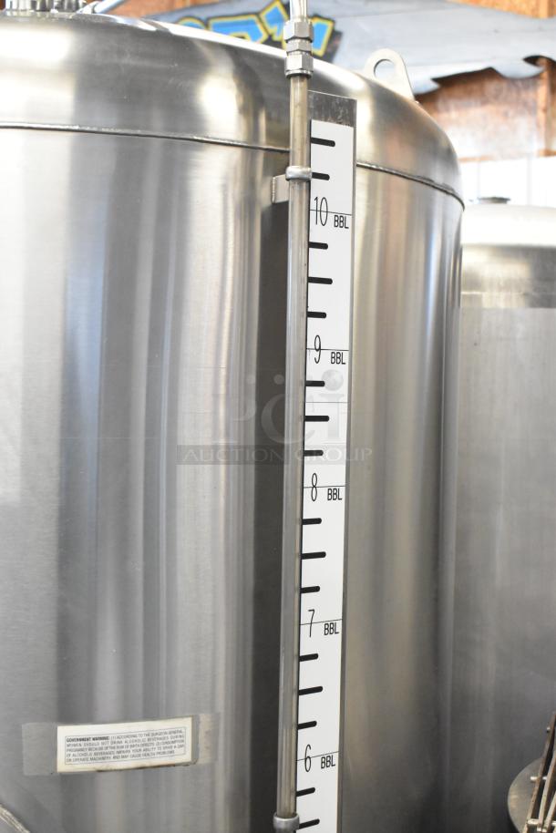 JV Northwest 10 BBL stainless steel beer brewing tank, commercial-grade condition. Capacity scale and warning label visible.