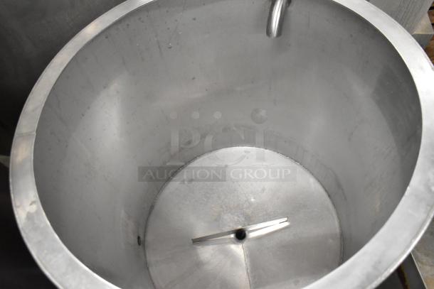 Metal commercial salad spinner on casters; large capacity, durable construction, stainless steel, internal stabilizer.