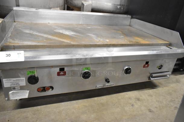 Southbend stainless steel commercial countertop gas griddle, well-used condition, visible controls, model label intact.