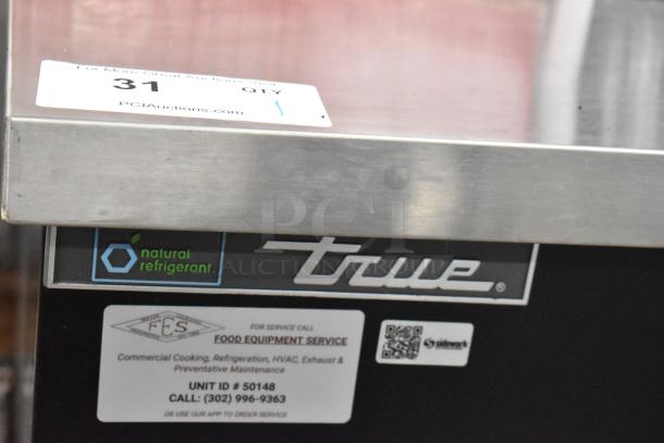 2023 True TBB-2G-HC-LD Metal Commercial Back Bar Cooler, 2 doors, 115V, natural refrigerant label, excellent condition.