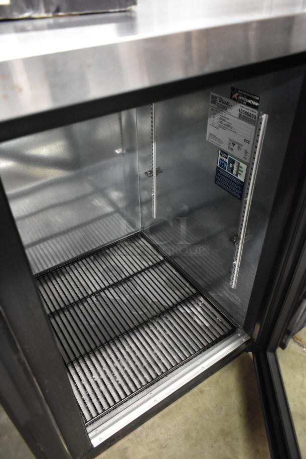 2023 True TBB-2G-HC-LD 2 Door Back Bar Cooler, metal interior, True label visible. 115V, 1 Phase, excellent condition.