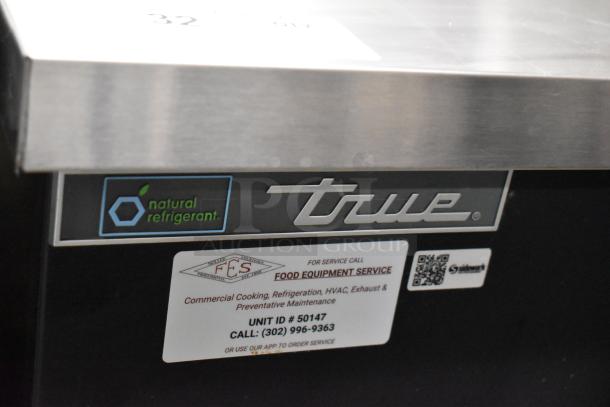 2023 True TBB-2G-HC-LD 2 Door Back Bar Cooler, stainless steel, natural refrigerant label, service contact info.