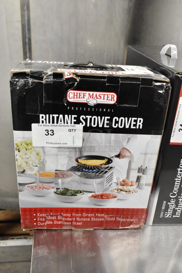 Brand new ChefMaster 90217 Butane Stove Cover in box, fits standard stoves, durable stainless steel. Box slightly damaged.