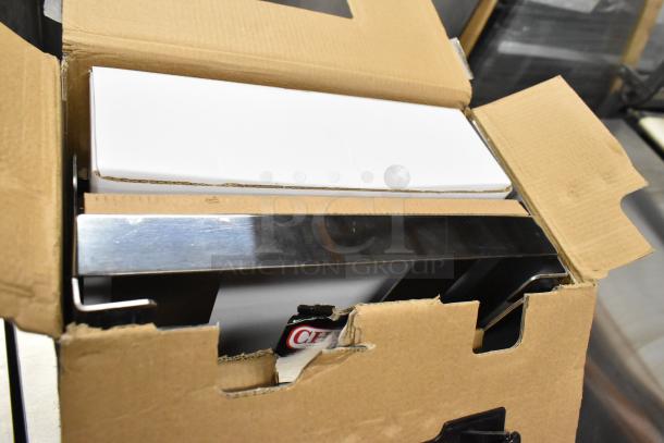 Brand new ChefMaster 90217 Butane Stove Cover in open box, showing stainless steel edge, pristine condition.