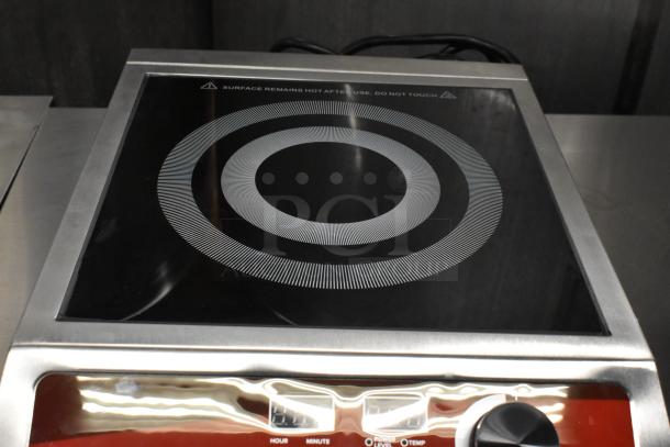 Brand new Avantco 177IC1800 stainless steel induction range, 120V, single burner, with digital controls.