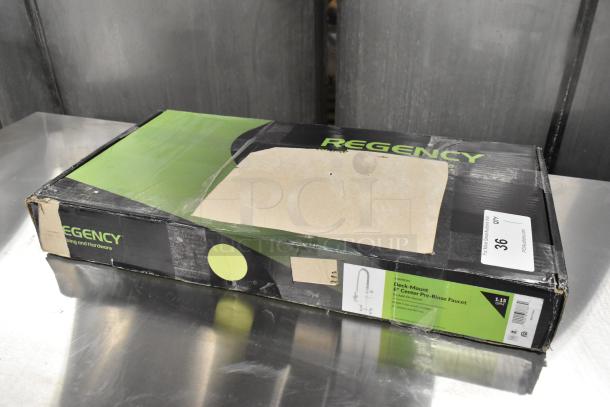 Brand new Regency 600PRA Pre-Rinse Add-On Faucet Base in unopened box. Features deck-mount design. Model and specs on label.
