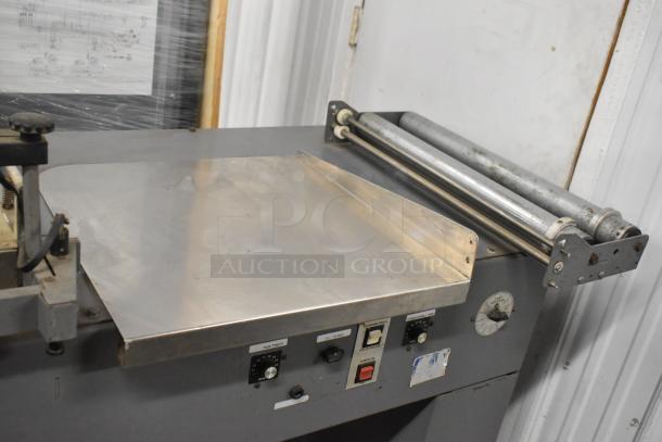 Beseler Metal Commercial Countertop Heat Sealer, 115 volts, 1 phase. Features control panel with dials and switches. Good condition.