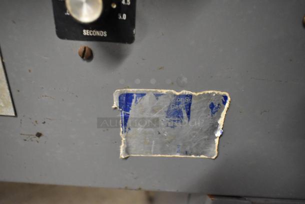 Beseler Metal Commercial Countertop Heat Sealer, 115 Volts, 1 Phase, visible wear, knob for timing in seconds.