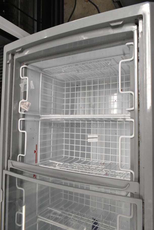 Excellence VBN-4 metal commercial chest freezer merchandiser with poly-coated baskets and commercial casters. 115 volts, 1 phase.