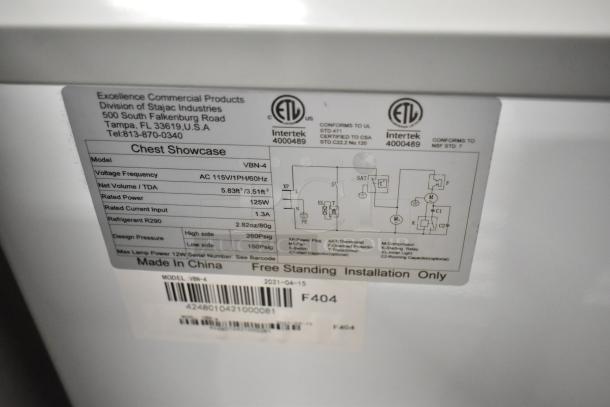 Excellence VBN-4 chest freezer specification label, detailing voltage, power, refrigerant, and installation instructions.