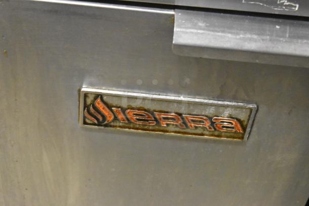 Sierra SRF-35/40NG stainless steel natural gas fryer, commercial floor style, visible wear, brand logo plate shown.