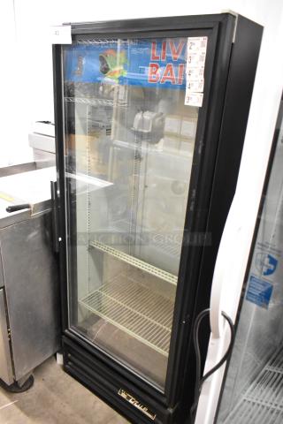 True GDM-12 commercial single door cooler, glass front, metal frame, poly coated racks, 115V, 1 phase, clean condition.