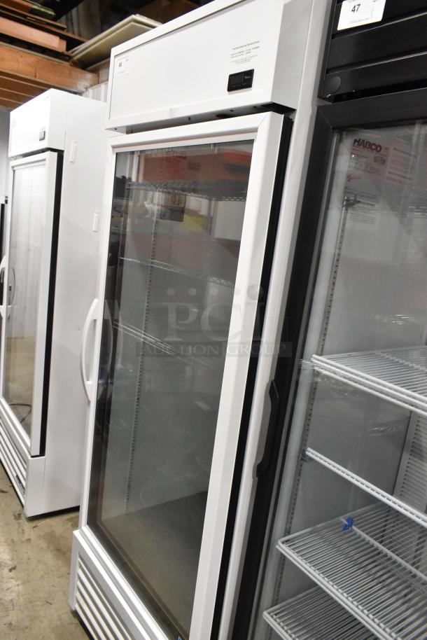 2021 True TSCI-600R-G-PH single door cooler, metal frame, glass door, poly-coated racks, 115V, 1 Phase, excellent condition.