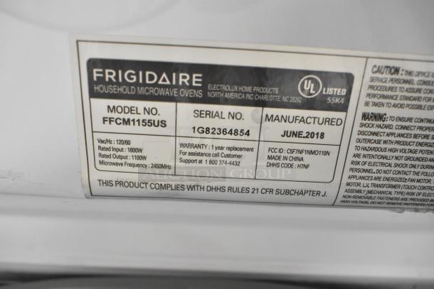 Frigidaire FFCM1155US Microwave Oven label details. Model, serial, voltage info. Made June 2018. 120 Volts, 1 Phase.