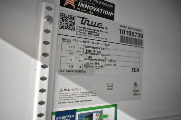 2021 True TSCI-600R-G-PH commercial cooler label, 115V, 1 Phase, model info, warnings, and refrigerant details visible.