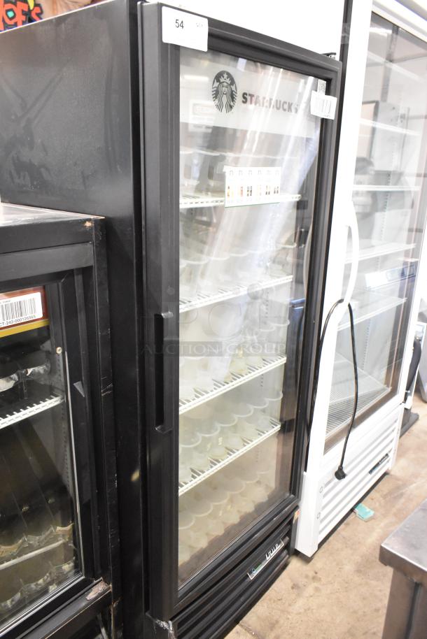 2017 True GDM-12-HC-LD single door cooler, black, with poly-coated racks, displaying Starbucks branding. 115V, 1 phase.