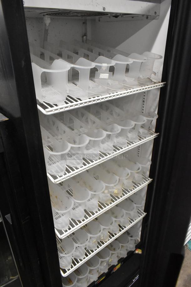 2017 True GDM-12-HC-LD single door cooler with poly coated racks, 115 volts, in used condition.