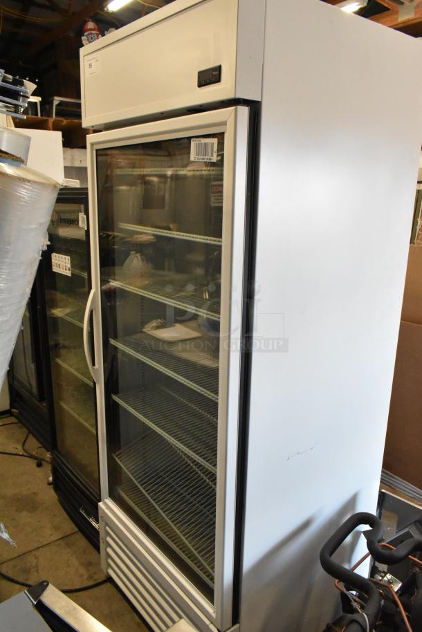2021 True TSCI-600R-G-PH single door reach-in cooler, 115V, with glass door, poly-coated racks, in good condition.