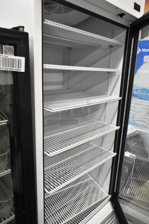 2021 True TSCI-600R-G-PH commercial cooler, glass door, poly-coated racks, 115V, 1 phase, excellent condition.