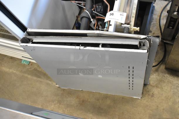 2024 Scotsman MC0522SW-32A ice machine head, stainless steel, 28-230V, 1 phase, slight wear, auction tag visible.