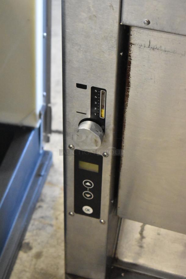 Prince Castle CTS-WS stainless steel vertical contact toaster, 120 volts, showing digital controls and temperature setting knob.