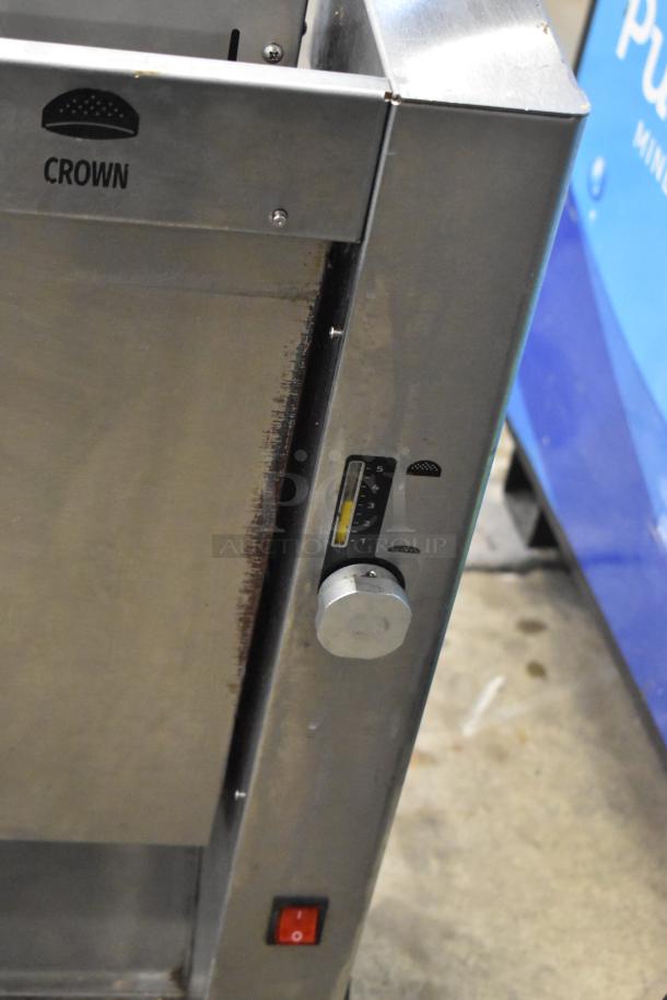 Prince Castle CTS-WS stainless steel vertical contact toaster. Features adjustable knob, power switch. Good condition.