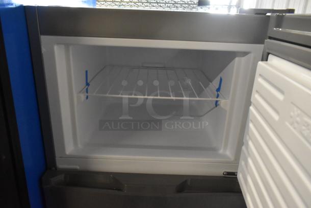 Frigidaire EFR780-T-6COM metal reach-in cooler with freezer, 115 volts, 1 phase; interior shelf and clean design.