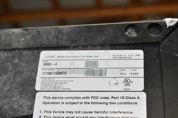 Crane 5800-4 Metal Commercial Bottled Drink Vending Machine label showing model, serial number, and compliance details.