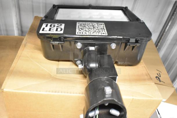 LED flood light, black casing, 162 LED label, QR code, mounted on a cardboard box, auction lot of 4 units.