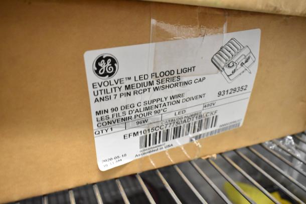 GE Evolve LED flood light box, model EFM1015CC. Utility medium series, 96W, 480V, assembled in USA. 4 lights included.