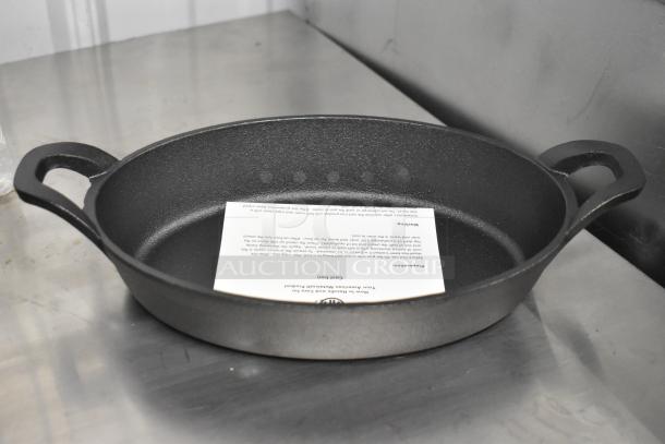 American Metalcraft CIPOV9567 36 oz. pre-seasoned mini cast iron oval casserole dish, new with tags.