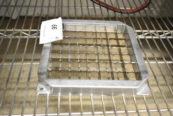 Brand new metal vegetable cutter blade, scratch and dent condition. Features wavy grid design, sturdy build, auction tag visible.