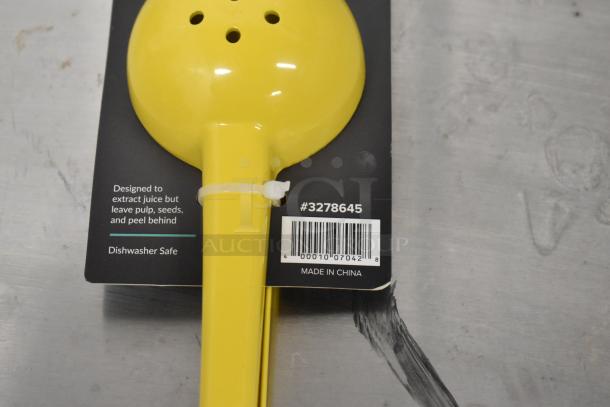 Yellow aluminum lemon juicer, model 3278645, new condition, dishwasher safe, with attached product tag.