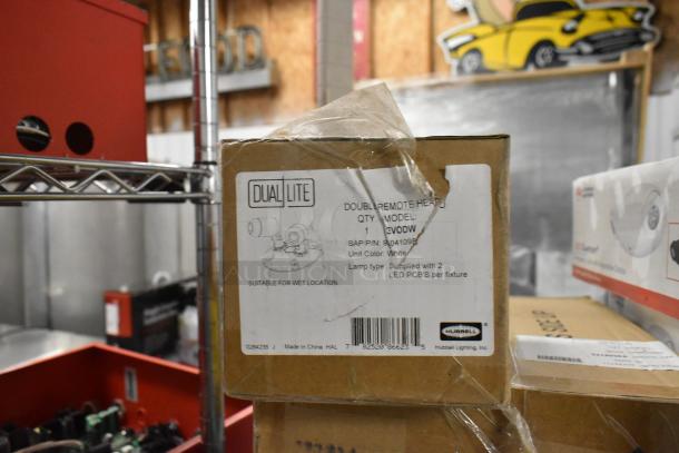 Box of Dual Lite Double Remote Head, model EVO DW, SAP P/N: 90410998, white, with LED PCB, suitable for wet locations.
