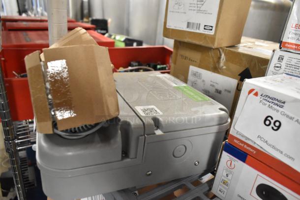 3 items including Dual Lite Double Remote Head, and Dual Lite DYN6I-WM Emergency Light. Good condition, original packaging.