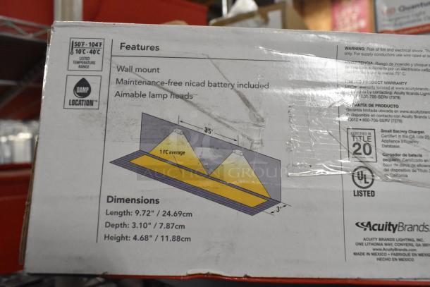 Box of Lithonia Lighting emergency lights with features listed: wall mount, NiCad battery, and aimable lamp heads. Dimensions: 9.72" x 3.10" x 4.68". Certified for damp locations.